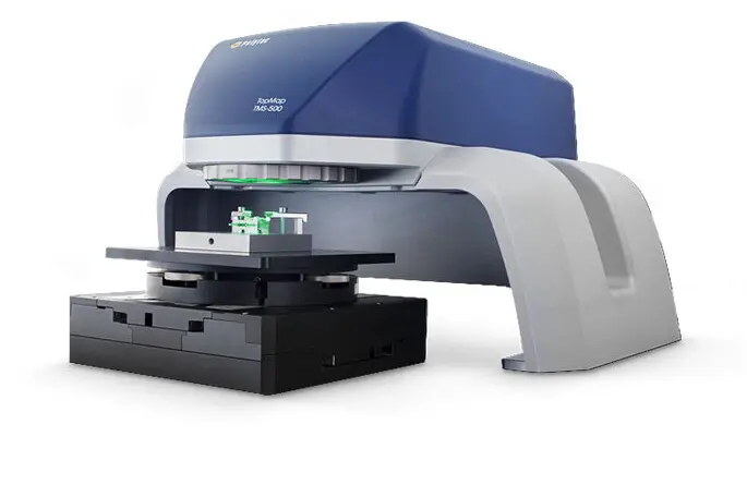 Polytec Metro.Lab white-light interferometer measuring flatness, step height, and parallelism on compact parts with high precision.