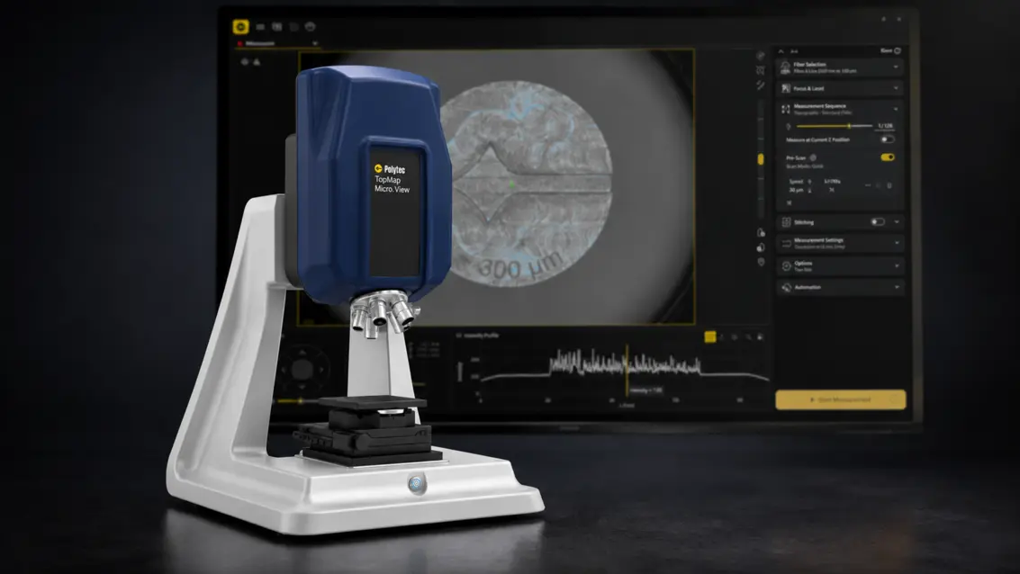 Polytec Micro.View surface profiler with Sherpa software displaying a detailed micrograph and measurement data on screen.