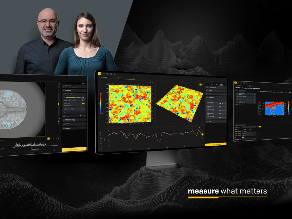 Two professionals with Polytec TopMap Sherpa software displaying colorful topography analysis and measurement data on multiple screens.