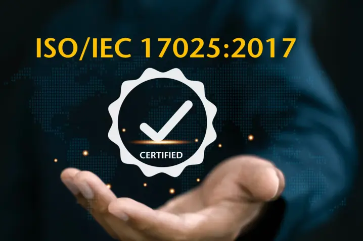 Hand holding a digital certification badge with ISO/IEC 17025:2017 text, symbolizing Polytec's accredited quality testing.